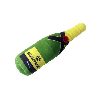 Soft green plush wine bottle pet toy for cats and dogs on a white background.