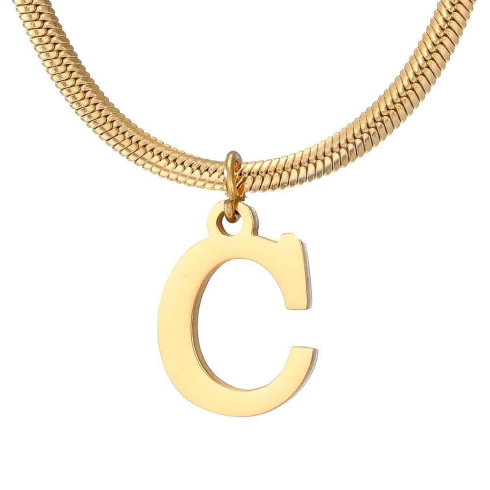 Elegant gold A-Z letter pendant necklace on a snake chain