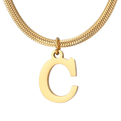 Elegant gold A-Z letter pendant necklace on a snake chain