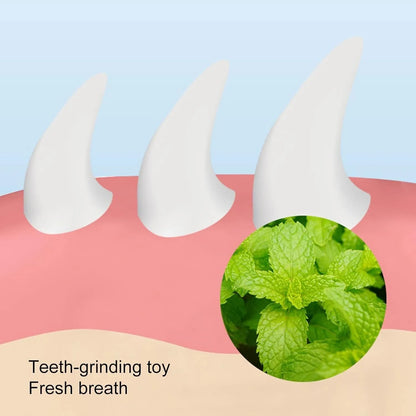 Four blue carrot-shaped catnip balls with adhesive backs and clear covers on a white wall
