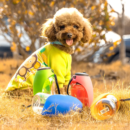Blue portable pet water bottle with drinking bowl for dogs, showing 680ml capacity and hanging attachment
