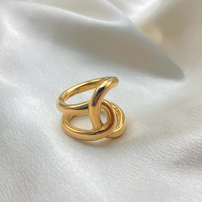 Women's stainless steel adjustable ring with a knotted detail on a geometric U-shape band.