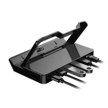 GPD WIN4 handheld game console sitting in a black docking base expander showing multiple ports on the front.