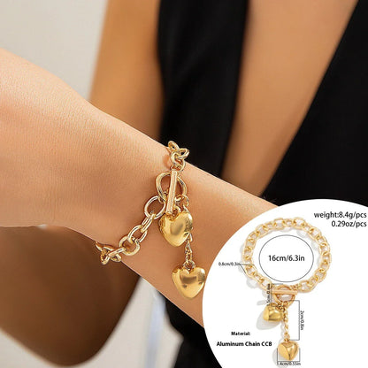 Elegant chain necklace and bracelet set with shiny lock and key pendant, fashionable ladies accessories