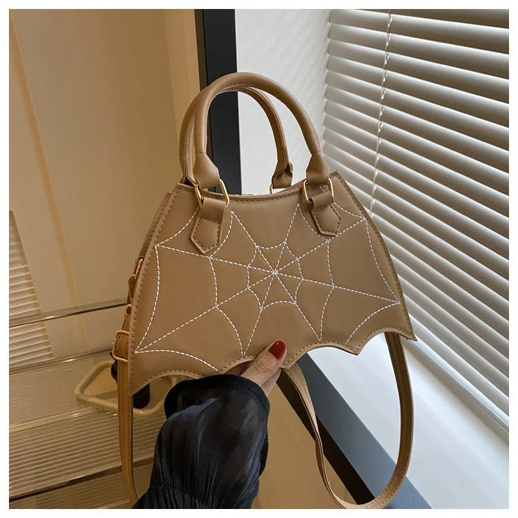 Stylish spider web design shoulder bag in various colours for Halloween fashion