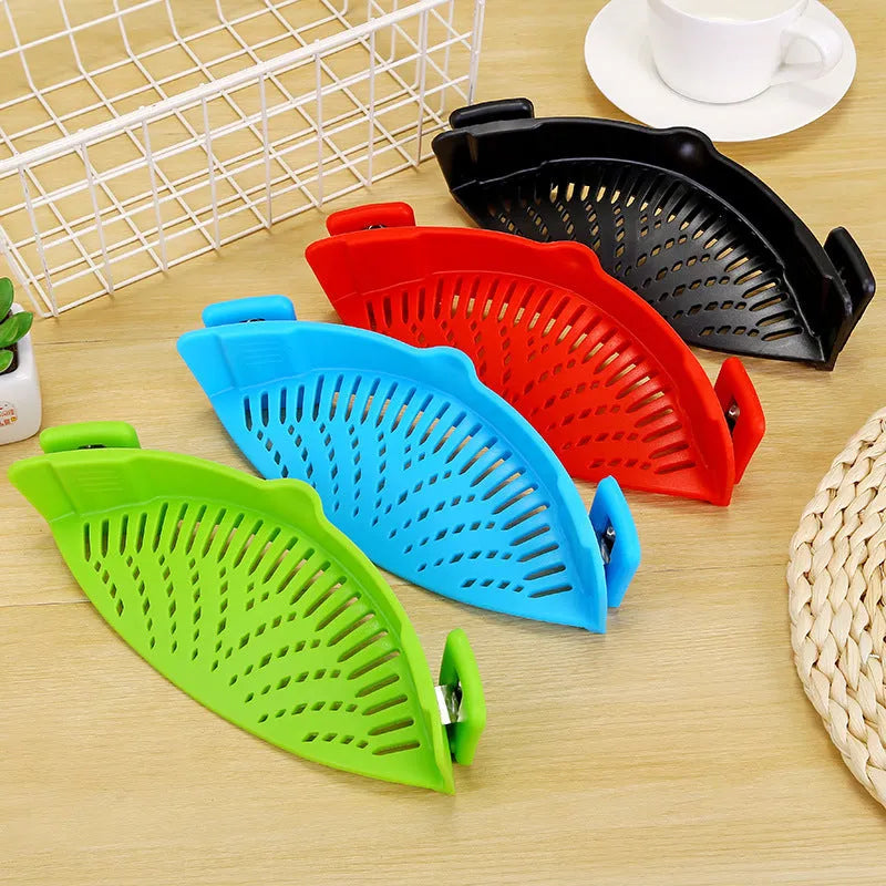 Silicone clip-on pot strainer in multiple colours for draining liquids, with buckle design and uniform hollow pattern