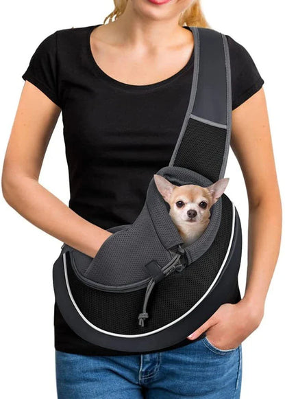 A stylish and secure crossbody carrier bag designed for transporting pets comfortably and safely