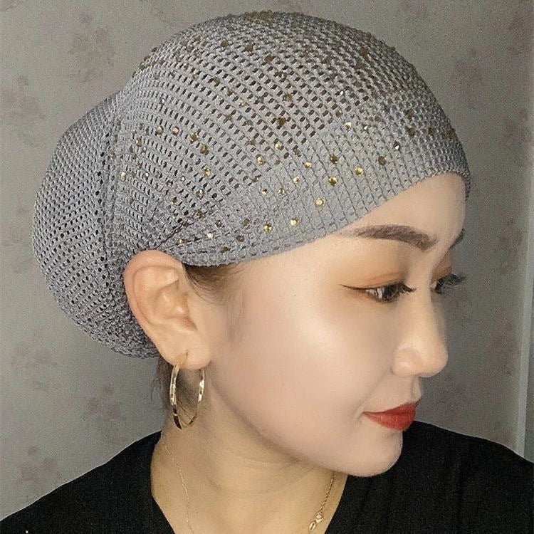 Stylish knitted beanie cap with hollow-out pattern in various colors, perfect for keeping warm and fashionable in the UK