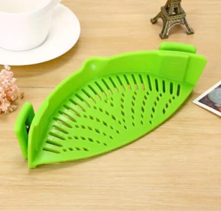 Silicone clip-on pot strainer in multiple colours for draining liquids, with buckle design and uniform hollow pattern
