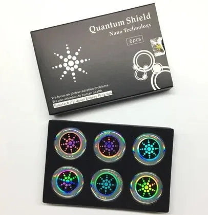 Box containing six gold and silver anti-electromagnetic wave stickers for mobile phones