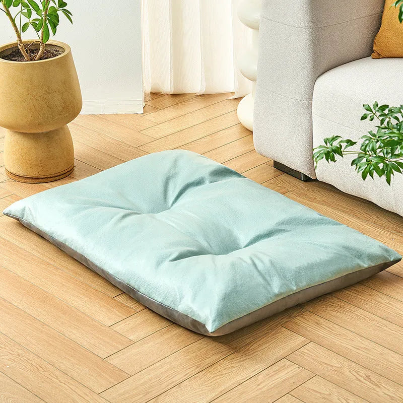 Blue and coffee coloured rectangular pet cooling mat shown in small, medium, large, and extra-large sizes.