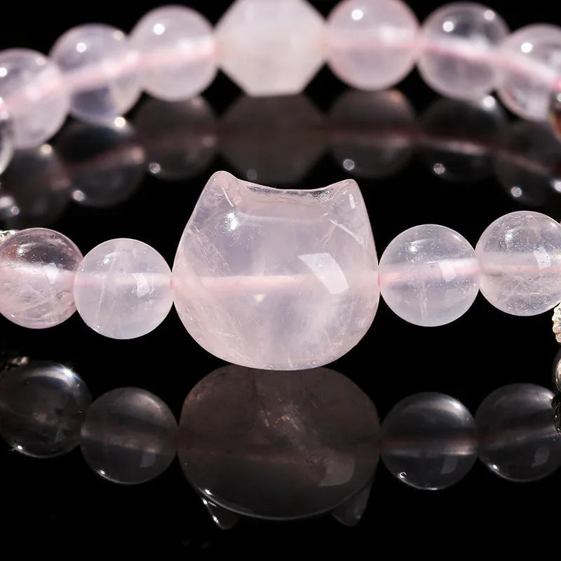 Women's geometric cat head bracelet with pink crystal beads and copper setting