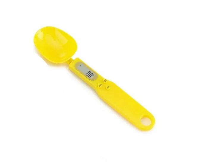 White digital spoon kitchen scale with LCD display showing weight measurement