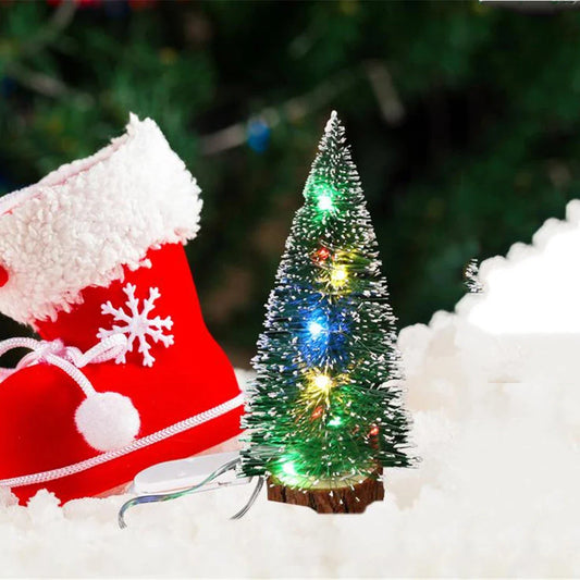 Charming mini LED Christmas tree with warm, twinkling lights and festive holiday decor