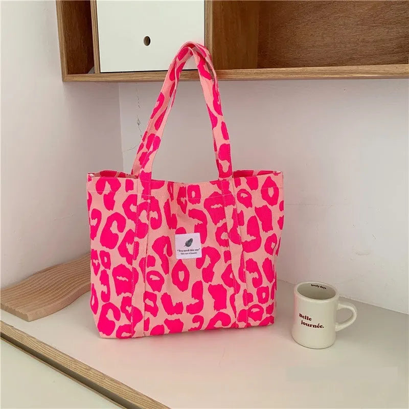 Large simple canvas shoulder bag for women in Oxford cloth with a three-dimensional pocket.