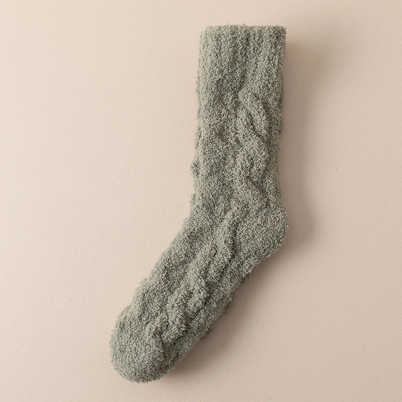 Plush coral fleece socks in various colors, designed for cozy and comfortable home wear
