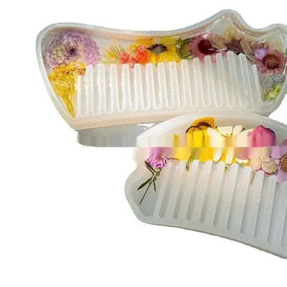 Mirrored glossy resin hair comb in three colour options, measuring under 10cm