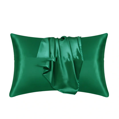 Envelope closure pillowcase in navy blue showing overlapping flap design and smooth polyester fabric texture
