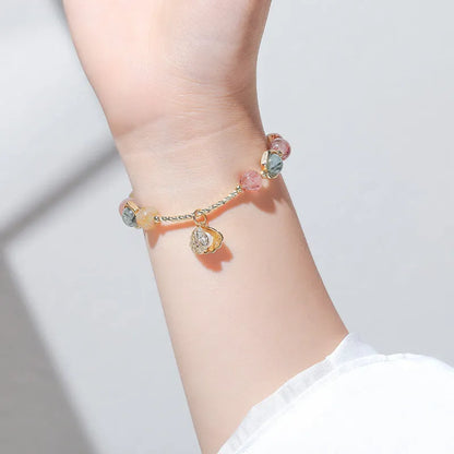 Women's crystal bracelet with coloured hair crystal shell and red sealant flower animal zodiac design