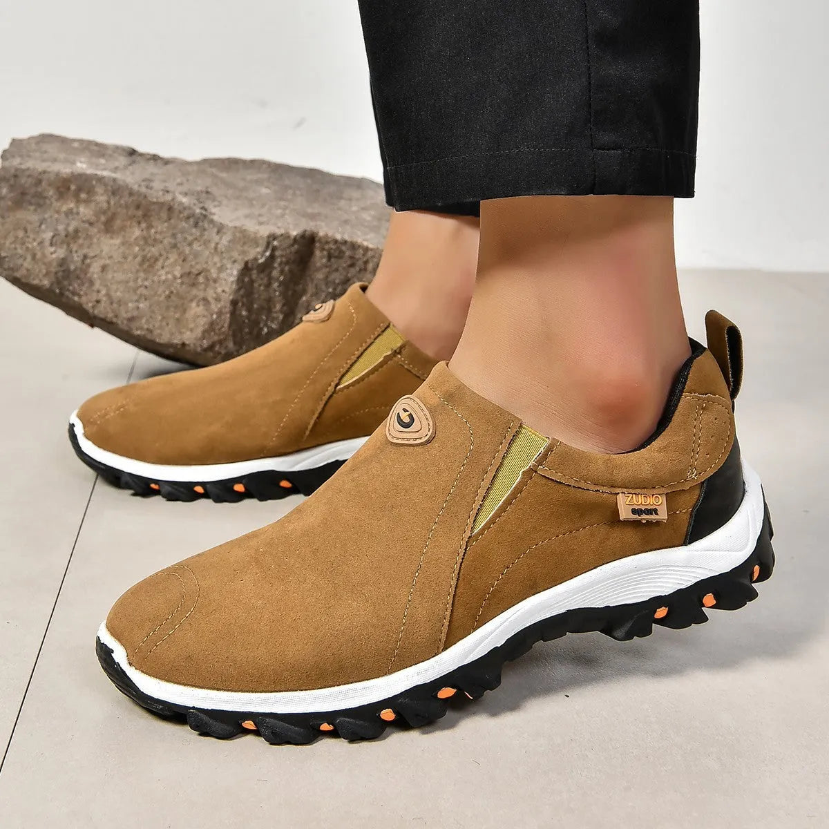 Men's grey round toe slip-on shoes with a shallow mouth on a rubber sole.