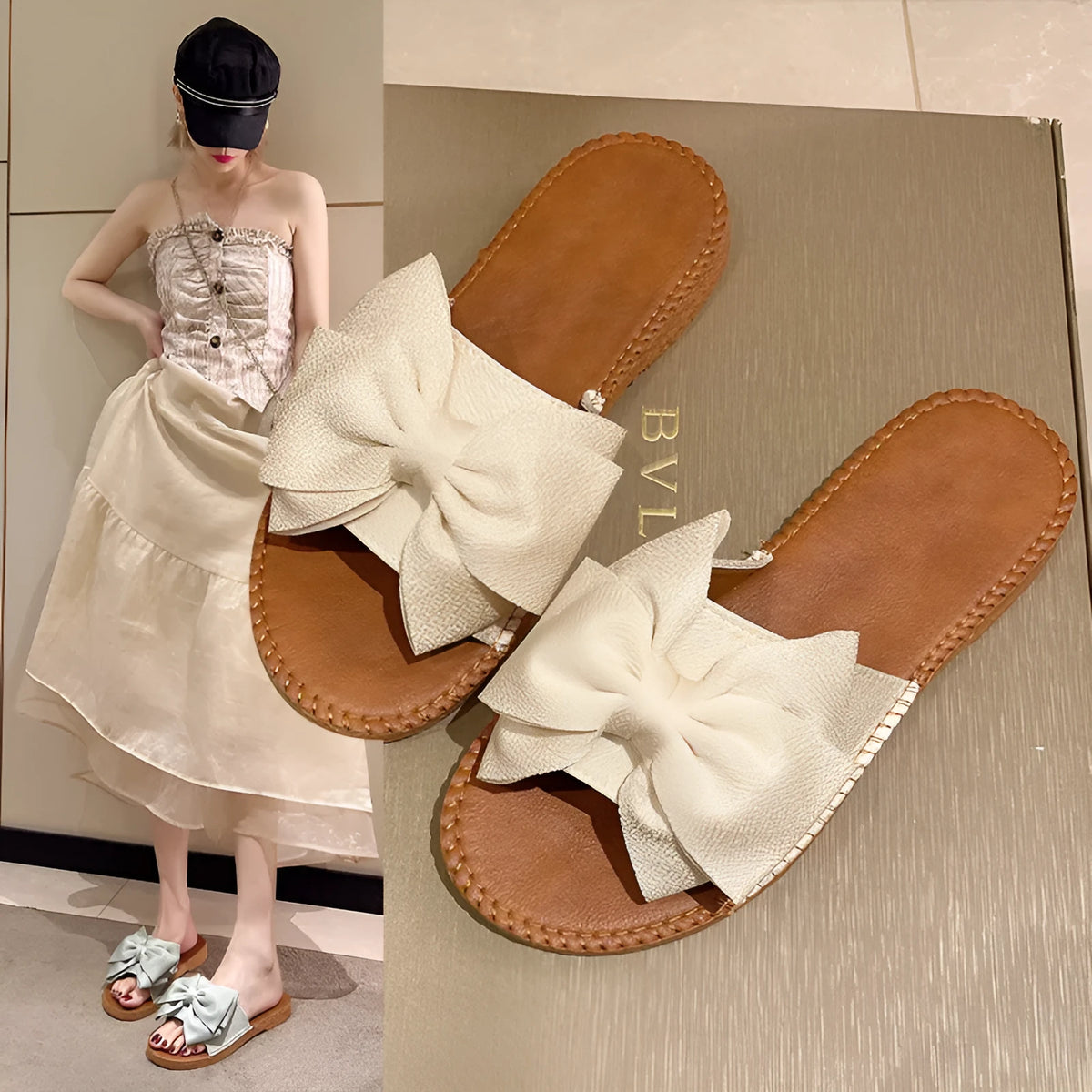 Women's beige suede slip-on sandals with a bow detail and soft rubber flat sole.