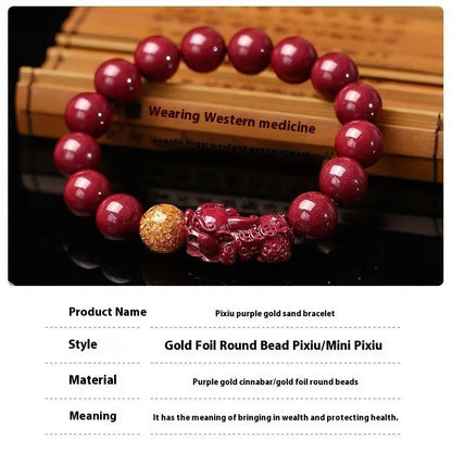 Purple gold sandstone cinnabar bracelet with totem design on a wrist, showing polished beads.