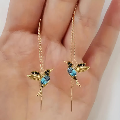Long drop bird design earrings with mixed zirconium wings in red, blue, or red lvzuan colour options.