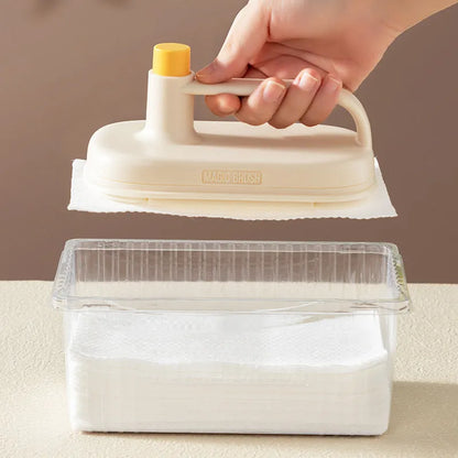 Magic disposable cleaning brush with handle, storage box, and pack of 50 white non-woven cloths for bathroom and kitchen cleaning.