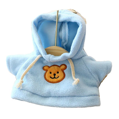 Cloth dog hoodie sweater in blue, shown in medium 23cm size on a small dog.