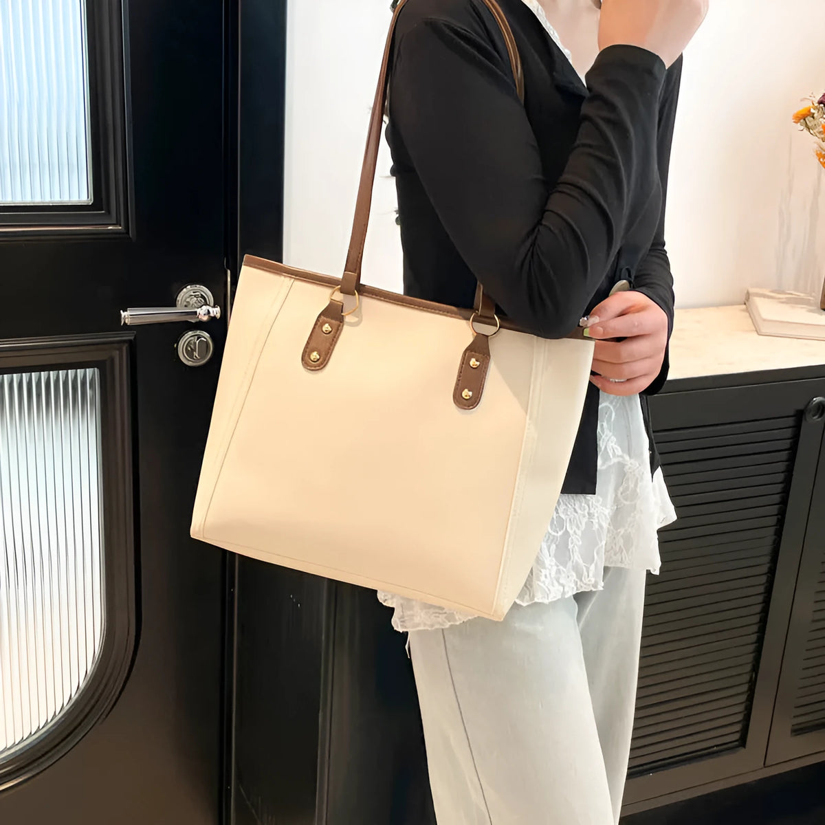 Korean style black PU leather shoulder underarm bag with a horizontal square shape and sandwich pocket.