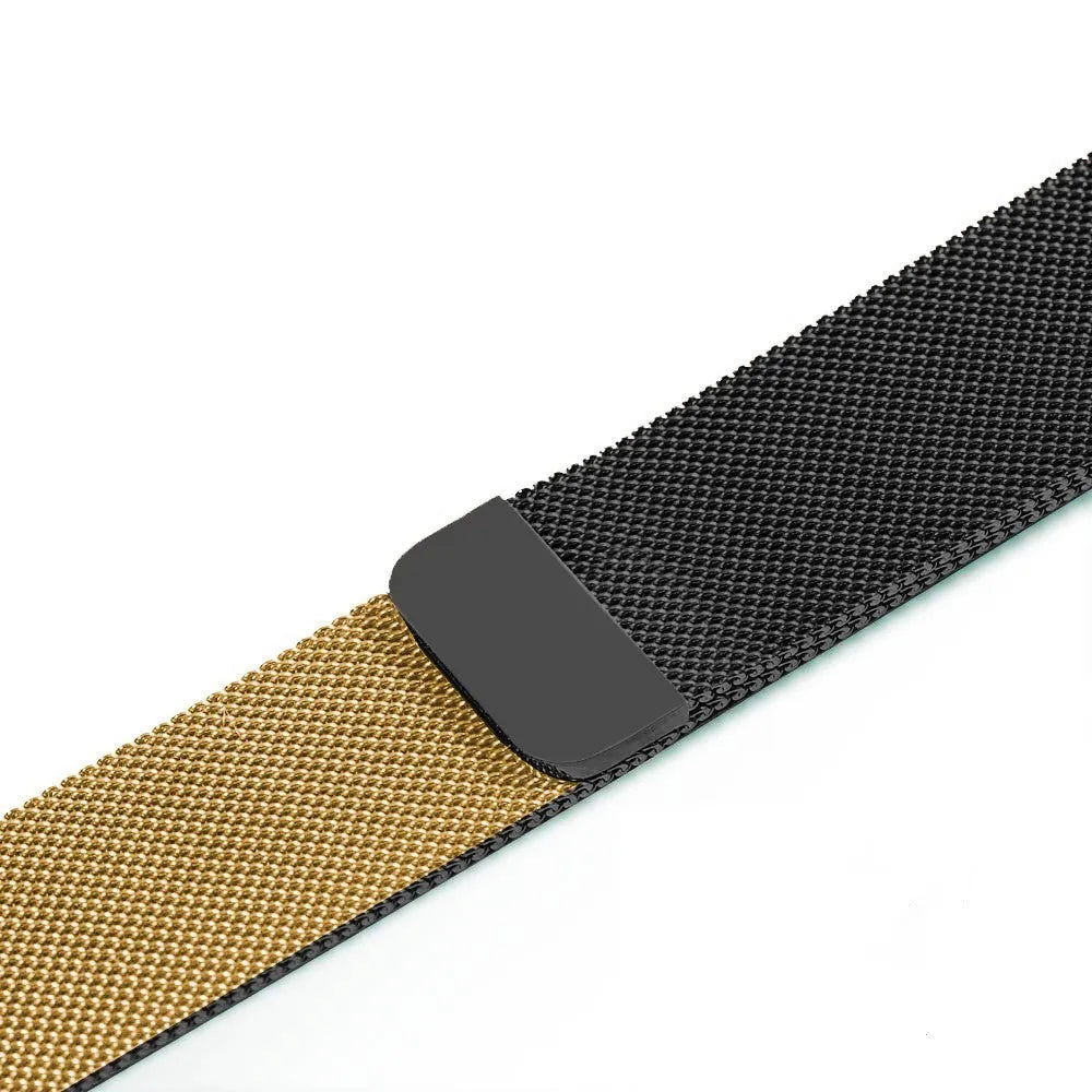 Stainless steel Apple Watch strap in silver on a wrist, showing the metal links and secure clasp.