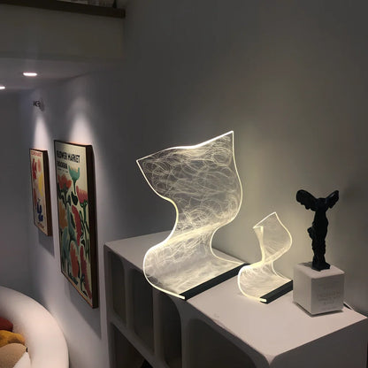 USB-powered bedside lamp with three colour settings and compact design