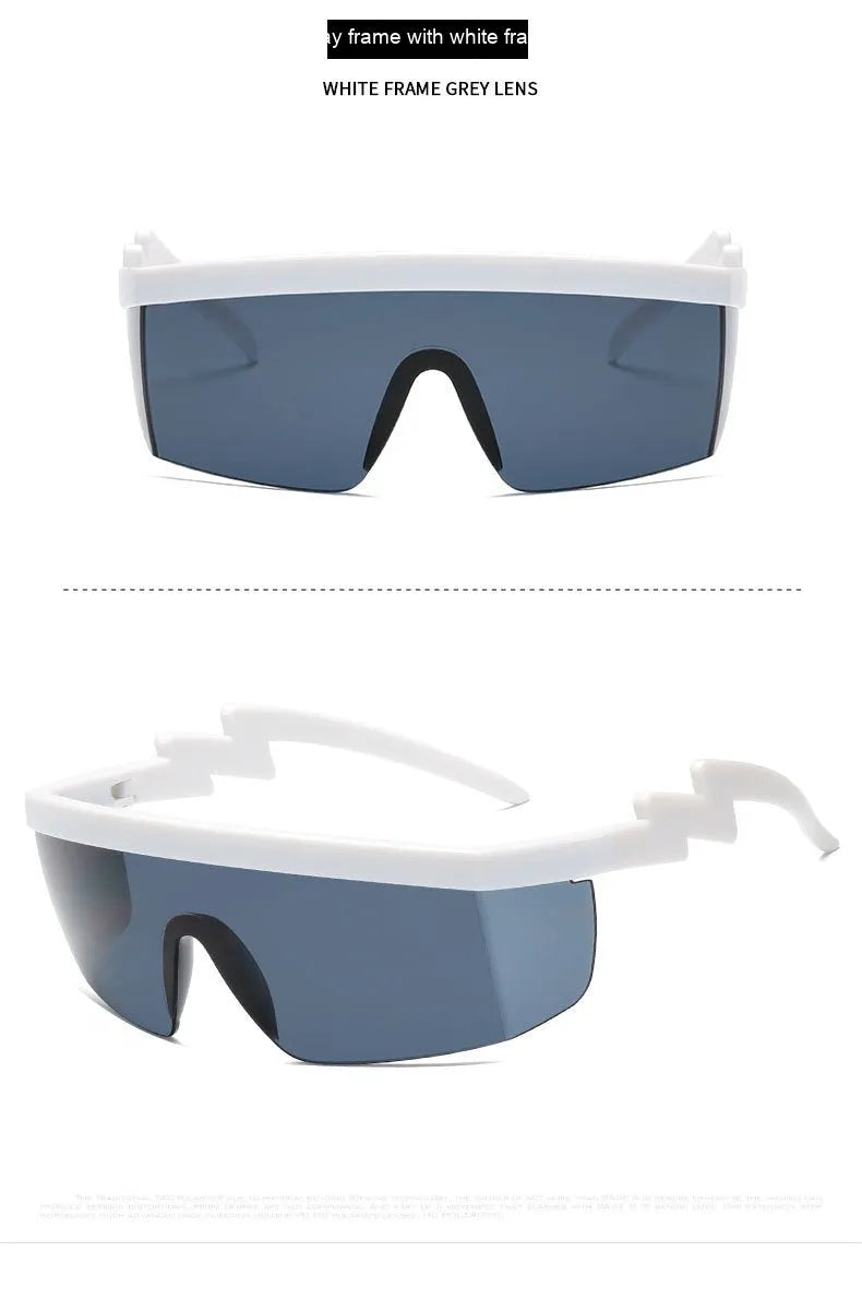 Black one-piece cycling sunglasses with blue polycarbonate lenses and lightning leg temples on a grey background.