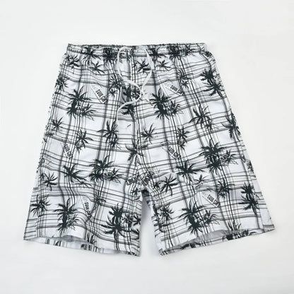 Men's floral patterned swim shorts with five-point cut design