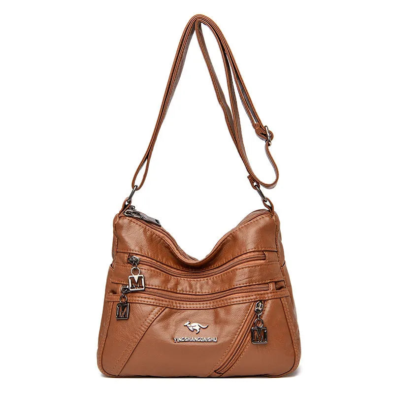 Middle-aged women's double layer PU shoulder bag with large capacity, welt pocket, and soft build in red, purple, dark blue, black, bronze, gray, or tan.