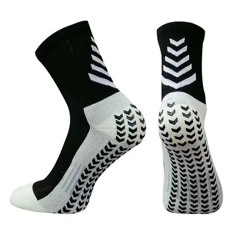 Men's mid-calf athletic football socks with geometric patterns and silicone grip sole