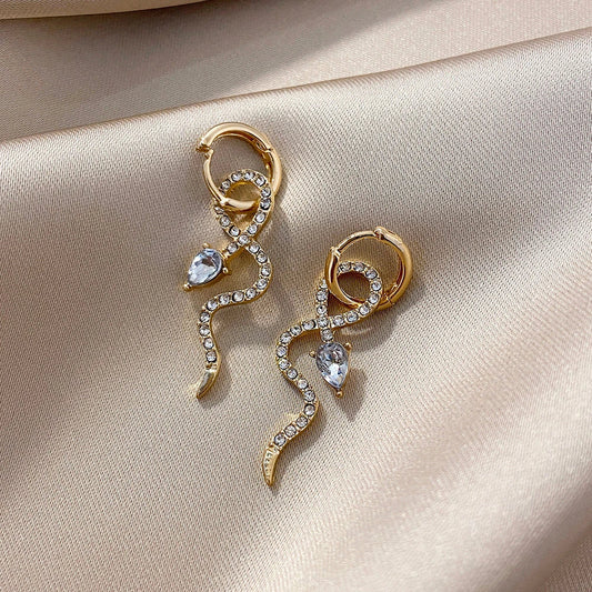 Elegant gold snake dangle earrings with a captivating serpentine design
