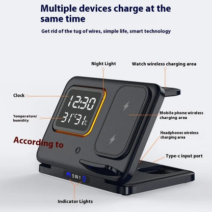 Black wireless charging station showing phone, watch and headphones charging, with digital clock display.