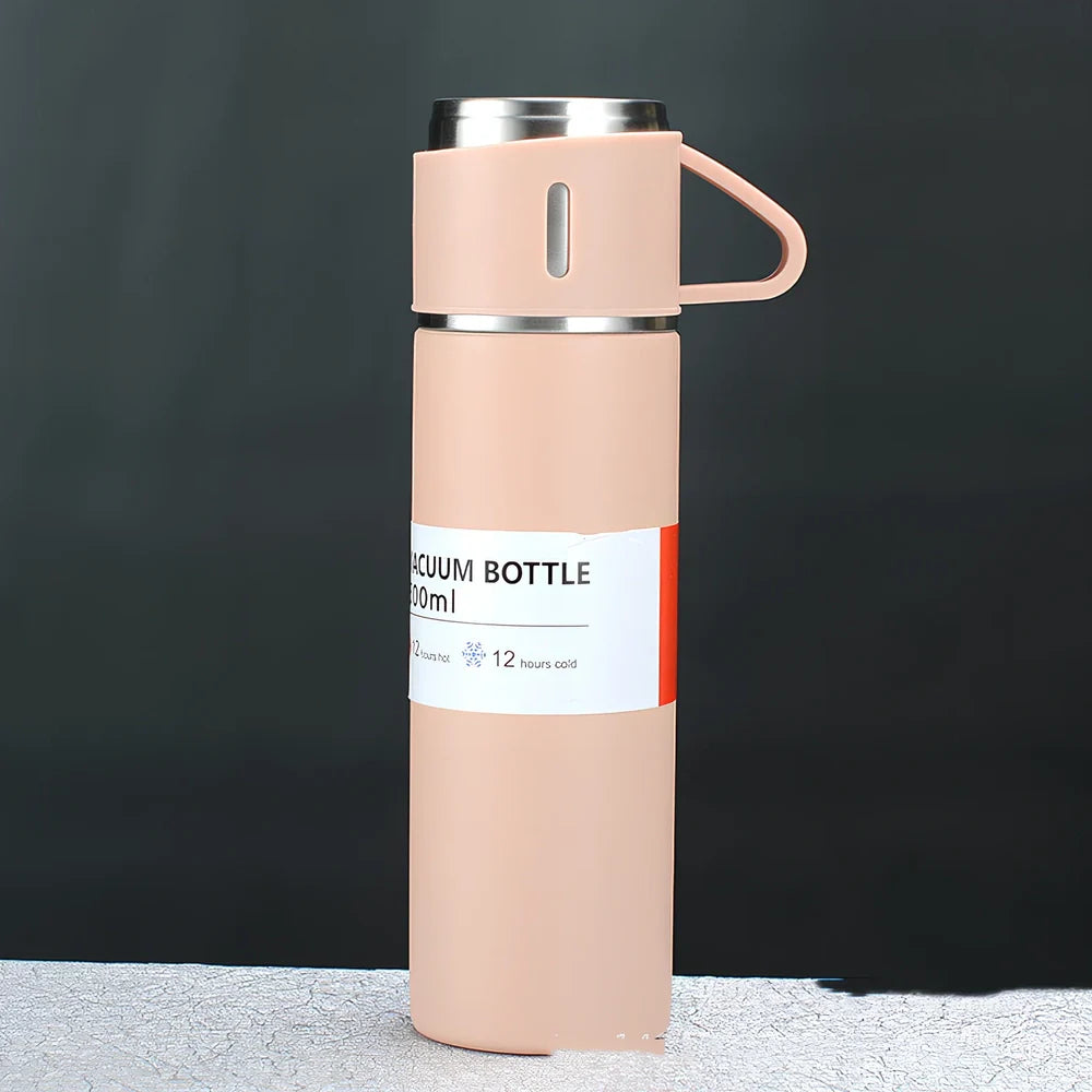 Pink stainless steel vacuum water cup with straight design showing 500ml capacity and gift box packaging