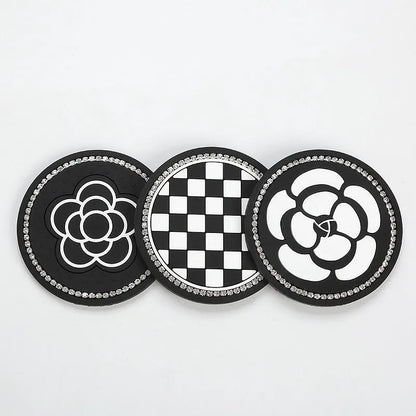 PVC plastic car cup holder mat with non-slip textured surface in black and white checkerboard pattern