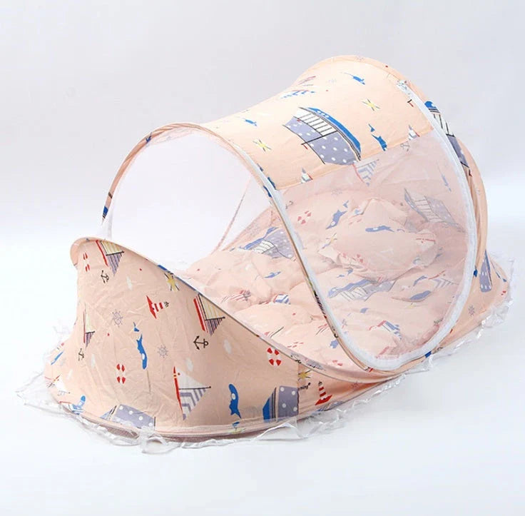 Breathable insect-free foldable baby travel cot with integrated mattress and pillow, available in blue, pink and blue-and-pink colour options