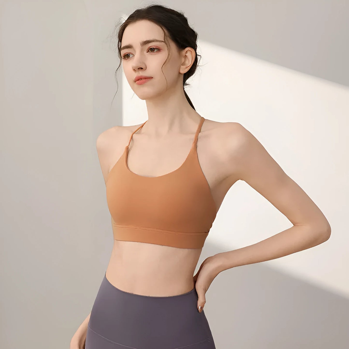 Women's nylon sports vest with double shoulder straps in sunshine desert colour.