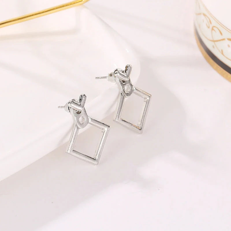Stylish hollow diamond square stud earrings for women, perfect for any occasion.
