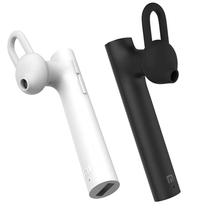 Black wireless Bluetooth headset showing compact 5.6cm design with charging cable