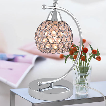 Crystal table lamp with chrome iron body measuring 31cm height
