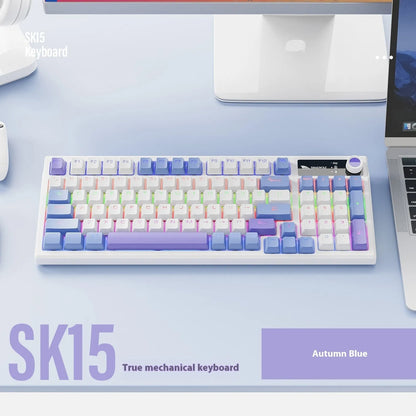 SK15 wired mechanical keyboard with rotary knob in choice of sunset orange, autumn water blue, or black colour for e-sports gaming