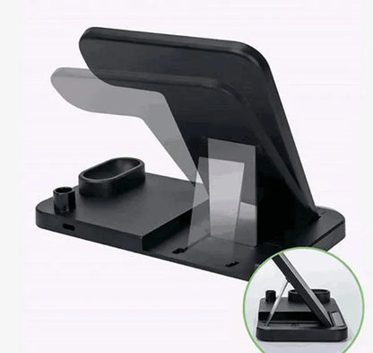 4-in-1 wireless charging station with adjustable magnetic stand charging phone, watch, earbuds, and stylus on a desk