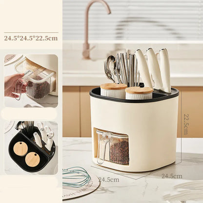 White rotating plastic kitchen storage bucket and a separate white spice box with four compartments on a countertop.