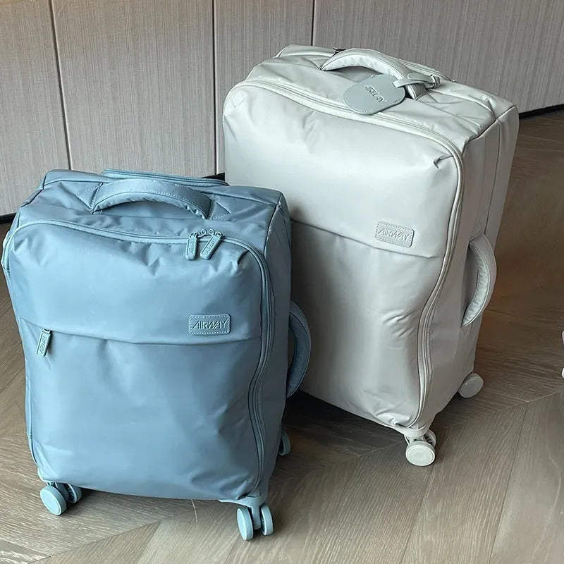 Ultra-light Waterproof Oxford Cloth Suitcase with Universal Wheels: 20-26 inch sizes, 1.2kg weight reduction, and 600D fabric for durable travel luggage
