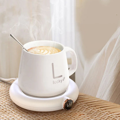 White USB coffee mug warmer coaster on desk with dimensions 130x110mm